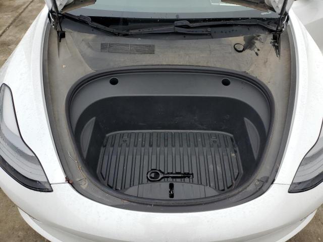 Photo 11 from auction – 2021 TESLA MODEL 3 with VIN 5YJ3E1EA9MF928628