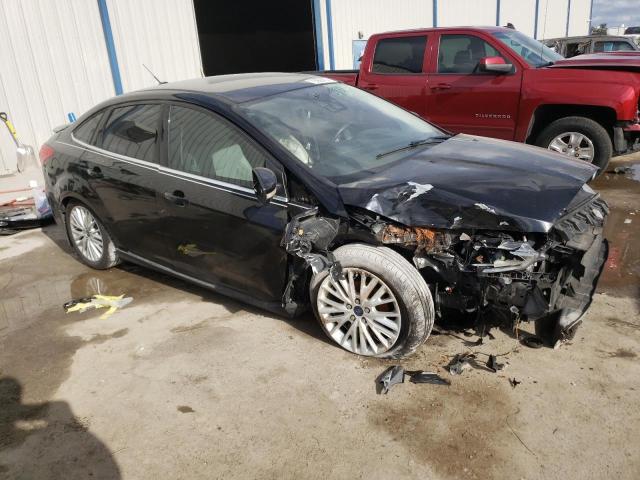 Photo 4 from auction – 2016 FORD FOCUS TITA with VIN 1FADP3J22GL219653