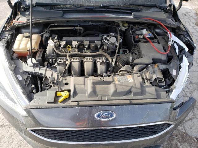 Photo 11 from auction – 2016 FORD FOCUS S with VIN 1FADP3E27GL398704