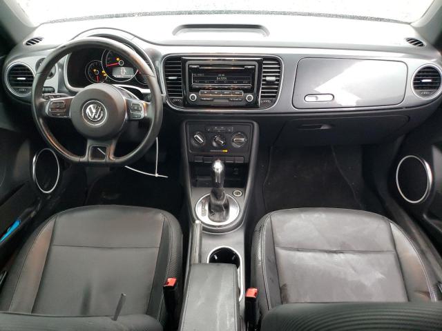 Photo 8 from auction – 2014 VOLKSWAGEN BEETLE with VIN 3VWJX7AT1EM601081