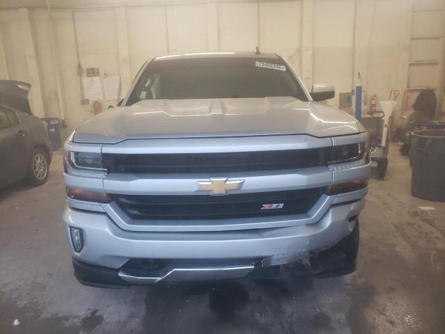 Photo 5 from auction – 2018 CHEVROLET SILVERADO with VIN 3GCUKREC0JG480461