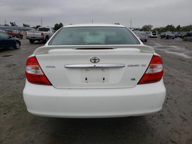 Photo 6 from auction – 2004 TOYOTA CAMRY LE with VIN JTDBF32K040152647