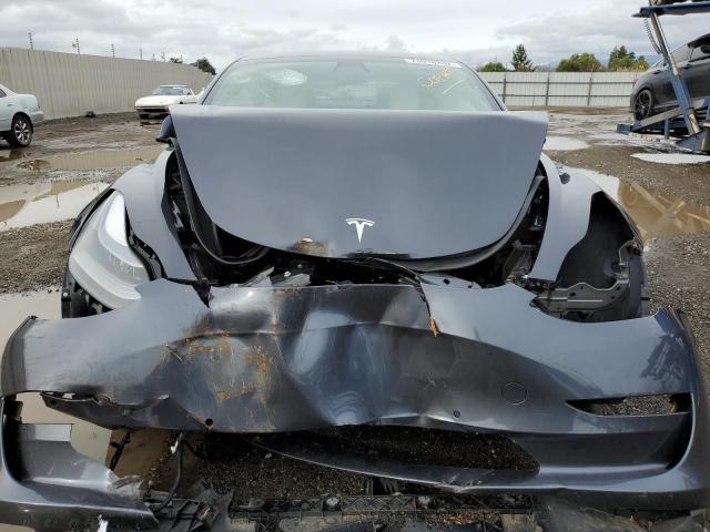 Photo 5 from auction – 2021 TESLA MODEL 3 with VIN 5YJ3E1EB0MF999774