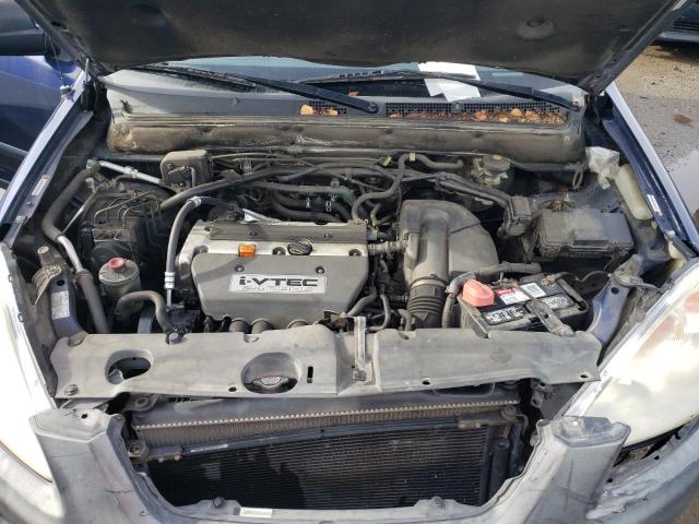 Photo 12 from auction – 2005 HONDA CR-V LX with VIN JHLRD68565C015643