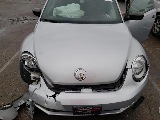 Photo 11 from auction – 2013 VOLKSWAGEN BEETLE with VIN 3VWFP7AT4DM627999