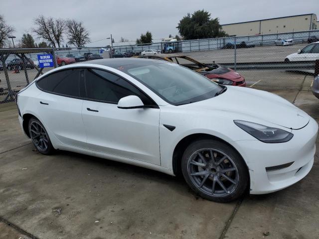Photo 4 from auction – 2021 TESLA MODEL 3 with VIN 5YJ3E1EA9MF928628