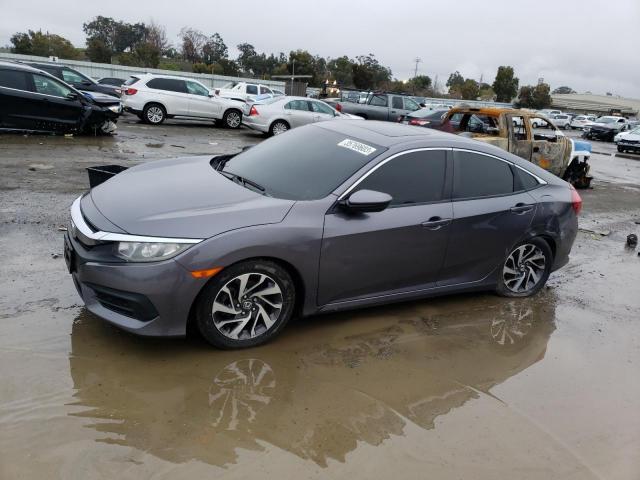 HONDA CIVIC EX 2017 with VIN 19XFC2F72HE227503 - Photo from auction