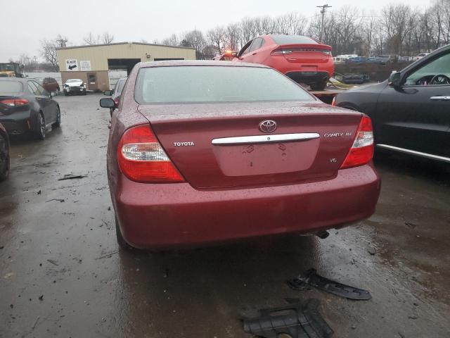 Photo 6 from auction – 2002 TOYOTA CAMRY LE with VIN JTDBF30K720005497