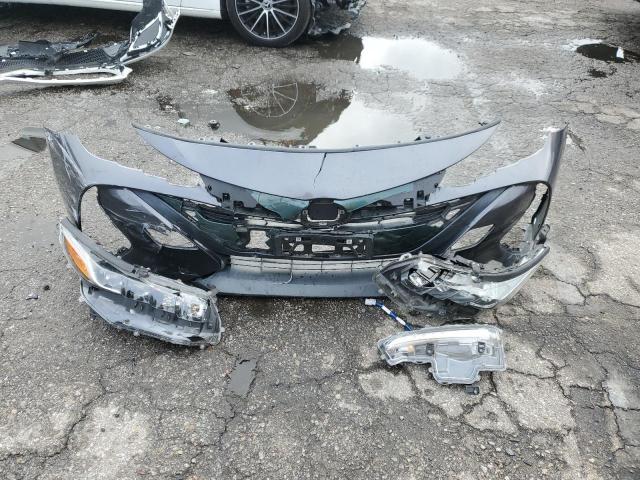 Photo 12 from auction – 2020 TOYOTA PRIUS PRIM with VIN JTDKARFP0L3124982