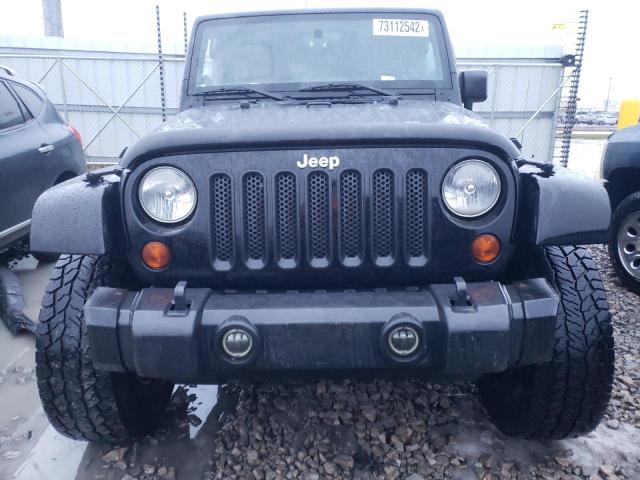 Photo 5 from auction – 2011 JEEP WRANGLER U with VIN 1J4HA5H10BL563233