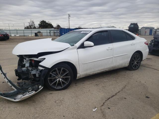 TOYOTA CAMRY LE 2017 with VIN 4T1BF1FK2HU294149 - Photo from auction
