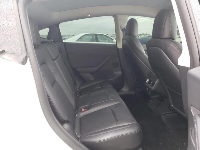 Photo 11 from auction – 2022 TESLA MODEL Y with VIN 7SAYGDEF5NF390463