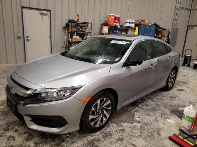 HONDA CIVIC EX 2018 with VIN 19XFC2F78JE037548 - Photo from auction