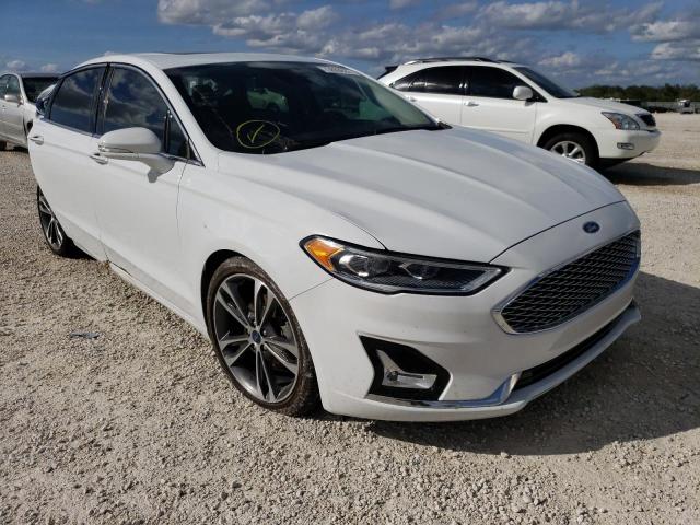 Photo 4 from auction – 2019 FORD FUSION TIT with VIN 3FA6P0K90KR144657