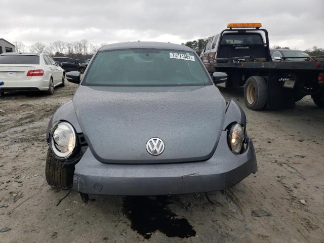 Photo 5 from auction – 2014 VOLKSWAGEN BEETLE with VIN 3VWJX7AT1EM601081