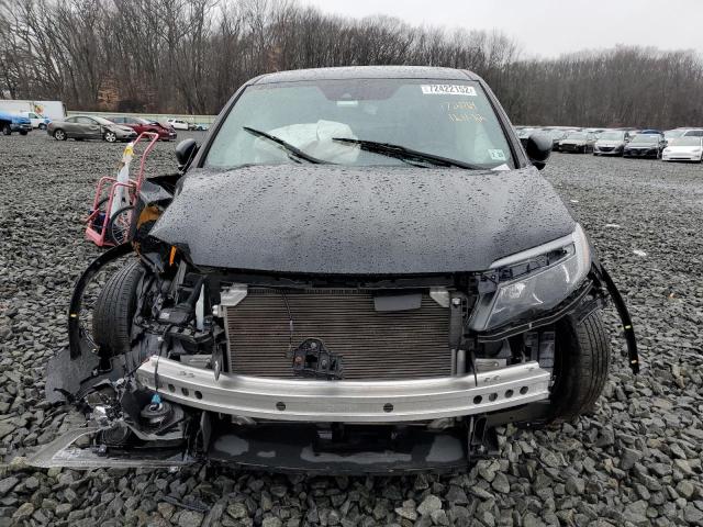 Photo 5 from auction – 2021 HONDA PASSPORT E with VIN 5FNYF8H57MB010239