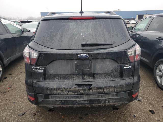 Photo 6 from auction – 2018 FORD ESCAPE SE with VIN 1FMCU9GD4JUB30352