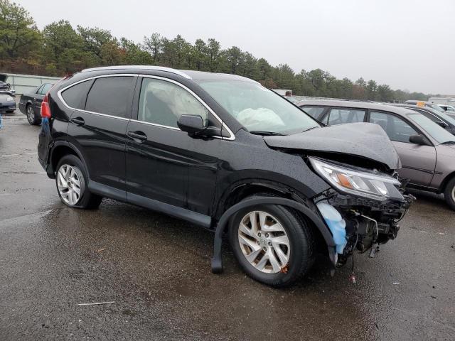 Photo 4 from auction – 2015 HONDA CR-V EXL with VIN 2HKRM4H75FH666268