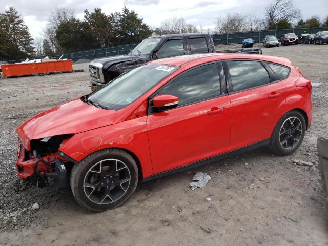 FORD FOCUS SE 2014 with VIN 1FADP3K23EL359710 - Photo from auction