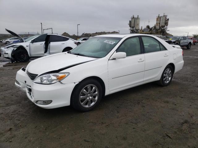 TOYOTA CAMRY LE 2004 with VIN JTDBF32K040152647 - Photo from auction