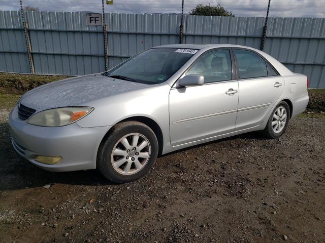 TOYOTA CAMRY 2002 with VIN 4T1BE30K82U609440 - Photo from auction