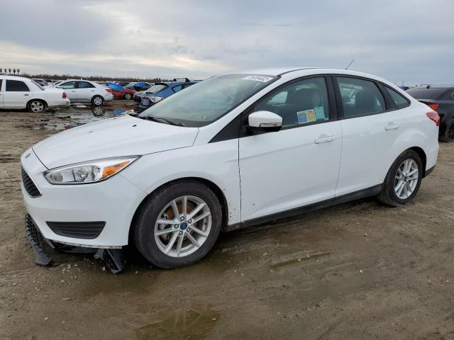 FORD FOCUS SE 2017 with VIN 1FADP3F23HL204542 - Photo from auction