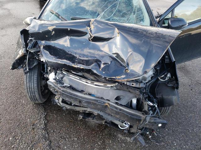Photo 11 from auction – 2014 TOYOTA PRIUS C with VIN JTDKDTB3XE1566772