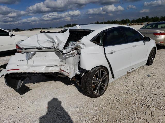 Photo 3 from auction – 2019 FORD FUSION TIT with VIN 3FA6P0K90KR144657