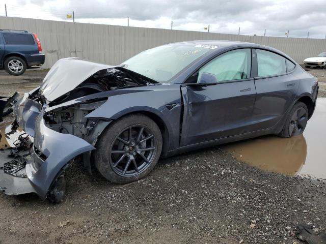 TESLA MODEL 3 2021 with VIN 5YJ3E1EB0MF999774 - Photo from auction