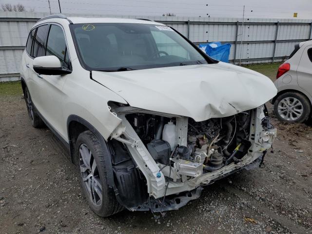 Photo 4 from auction – 2017 HONDA PILOT ELIT with VIN 5FNYF6H08HB076037