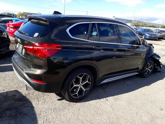 Photo 3 from auction – 2018 BMW X1 XDRIVE2 with VIN WBXHT3C34J5K28026