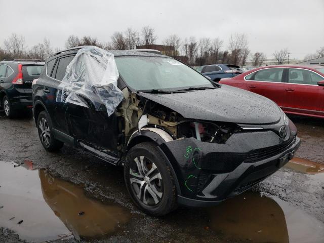 Photo 4 from auction – 2018 TOYOTA RAV4 LE with VIN 2T3BFREV6JW725132