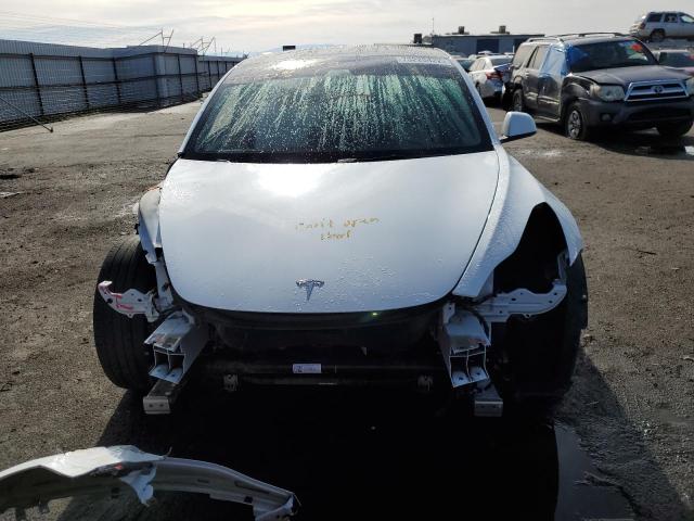 Photo 5 from auction – 2021 TESLA MODEL 3 with VIN 5YJ3E1EB9MF093168