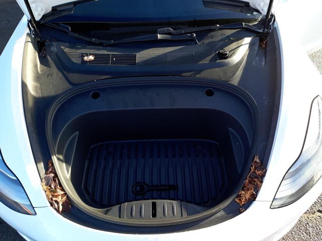 Photo 11 from auction – 2021 TESLA MODEL 3 with VIN 5YJ3E1EA4MF920761