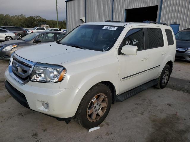 HONDA PILOT TOUR 2011 with VIN 5FNYF3H94BB057151 - Photo from auction