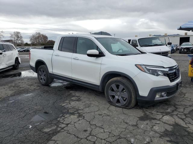 Photo 4 from auction – 2020 HONDA RIDGELINE with VIN 5FPYK3F71LB012349