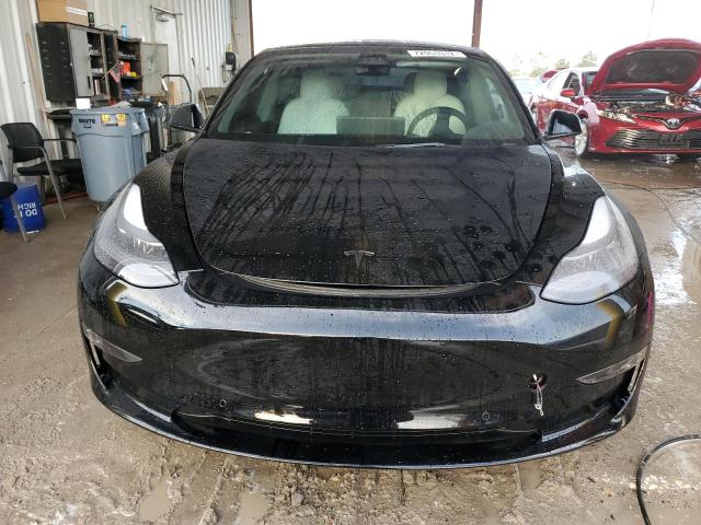 Photo 5 from auction – 2022 TESLA MODEL 3 with VIN 5YJ3E1EB3NF153348