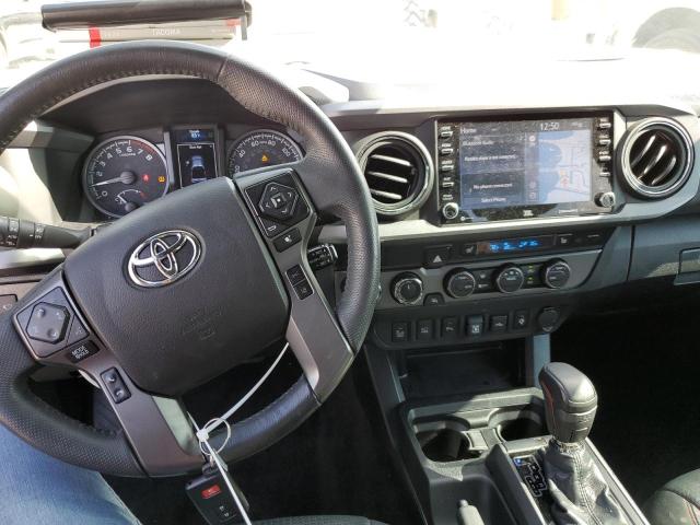 Photo 8 from auction – 2021 TOYOTA TACOMMA with VIN 5TFCZ5AN6MX258577