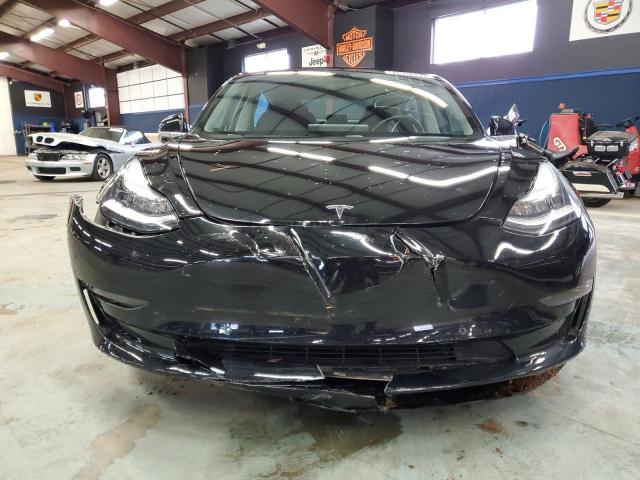 Photo 5 from auction – 2018 TESLA MODEL 3 with VIN 5YJ3E1EB5JF068277