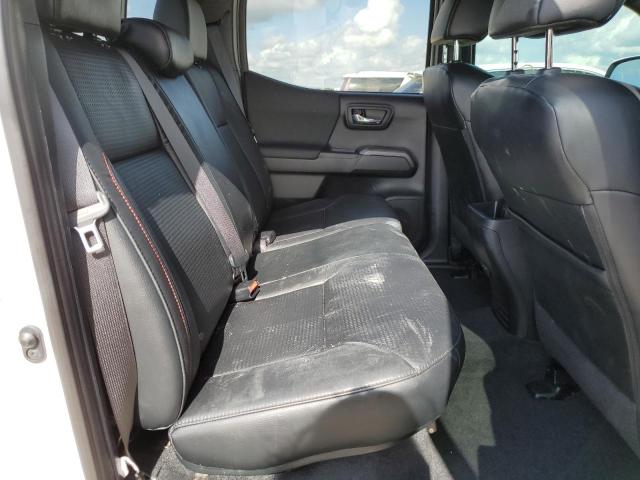 Photo 10 from auction – 2021 TOYOTA TACOMMA with VIN 5TFCZ5AN6MX258577