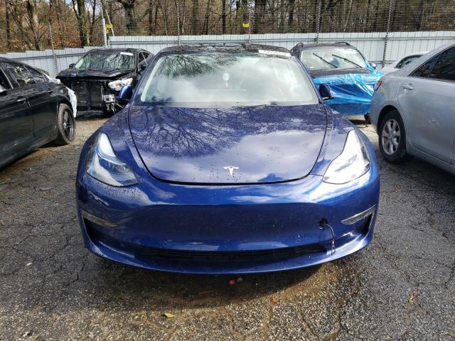 Photo 5 from auction – 2022 TESLA MODEL 3 with VIN 5YJ3E1EA6NF321233