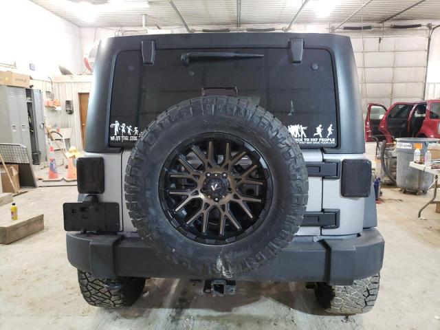 Photo 6 from auction – 2014 JEEP WRANGLER U with VIN 1C4BJWDG8EL115709