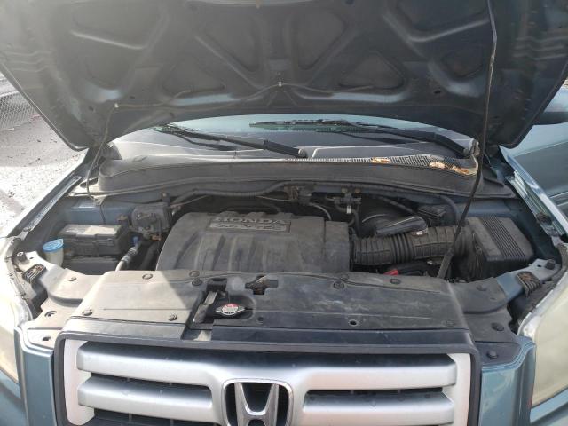 Photo 12 from auction – 2006 HONDA PILOT EX with VIN 2HKYF18696H521004