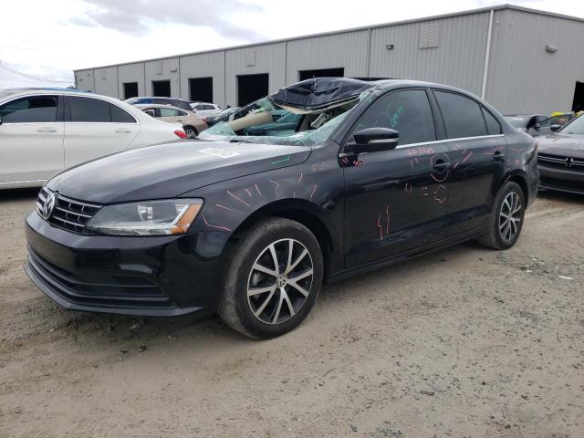 VOLKSWAGEN JETTA SE 2018 with VIN 3VWDB7AJ7JM241822 - Photo from auction