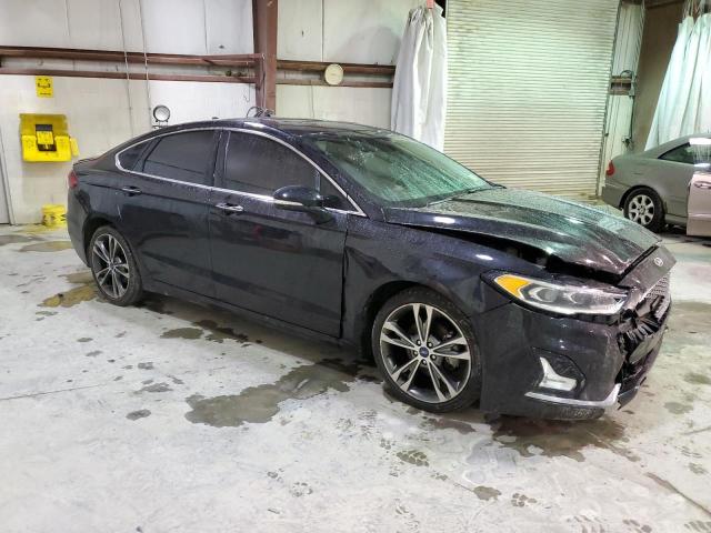 Photo 4 from auction – 2019 FORD FUSION TIT with VIN 3FA6P0D92KR239699