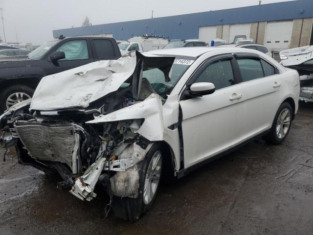 FORD TAURUS SEL 2014 with VIN 1FAHP2E82EG186539 - Photo from auction
