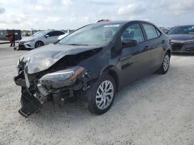 TOYOTA COROLLA L 2018 with VIN 5YFBURHE8JP802000 - Photo from auction