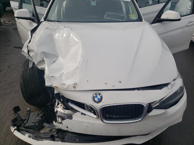 Photo 11 from auction – 2016 BMW 320 XI with VIN WBA8E5G52GNU19528