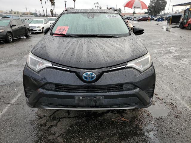 Photo 5 from auction – 2018 TOYOTA RAV4 HV LE with VIN JTMRJREV2JD226872
