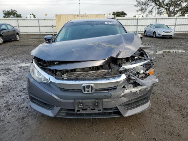 Photo 5 from auction – 2018 HONDA CIVIC LX with VIN 19XFC2E52JE040901